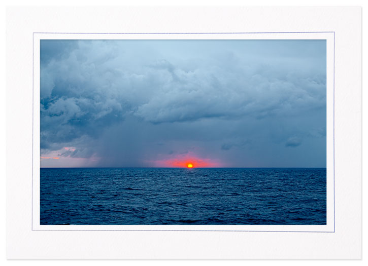 Thunderstorm and Sunrise at Sea