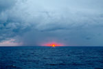 Thunderstorm and Sunrise at Sea