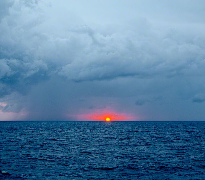 Thunderstorm and Sunrise at Sea